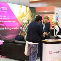 A backlit display wall at an exhibition